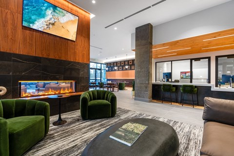 Clubroom with fireplace and seating