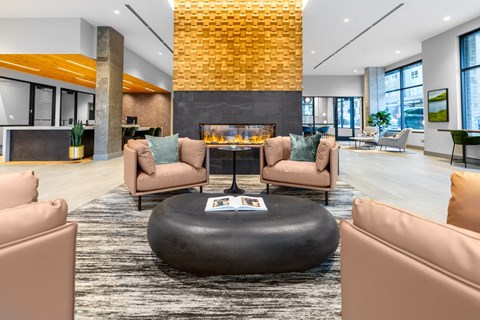 Clubroom with fireplace and seating