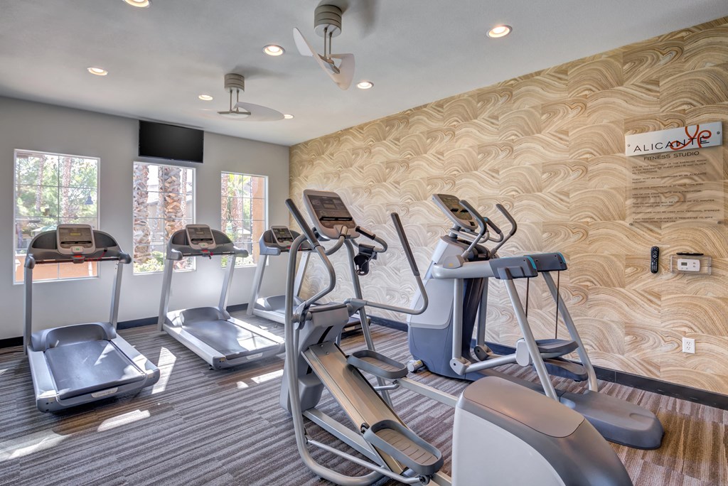 Spring Valley, NV Apartments - Alicante - Fitness Center with Treadmills, Elliptical Machines, and Large Windows
