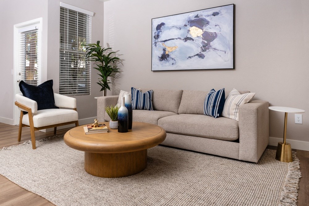 a living room with a couch and a coffee table