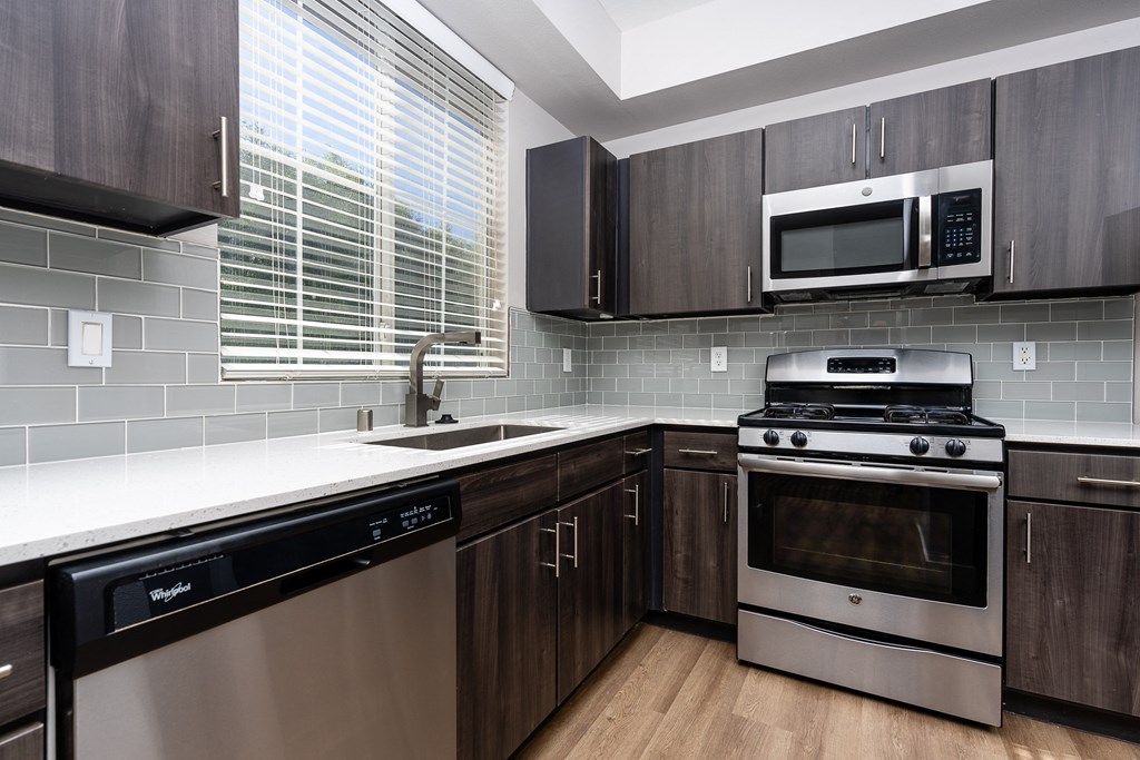 Apartments Spring Valley - Alicante - Kitchen with Stainless-Steel Appliances, Cabinets, Build-In Microwave and Wood-Style Floors