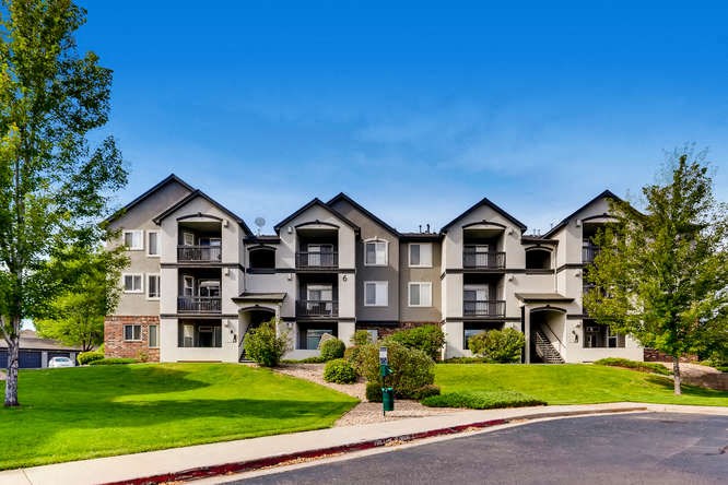 Dog-Friendly Apartments in Denver, CO- Allure- Building Exterior with Manicured Landscaping Throughout The Property