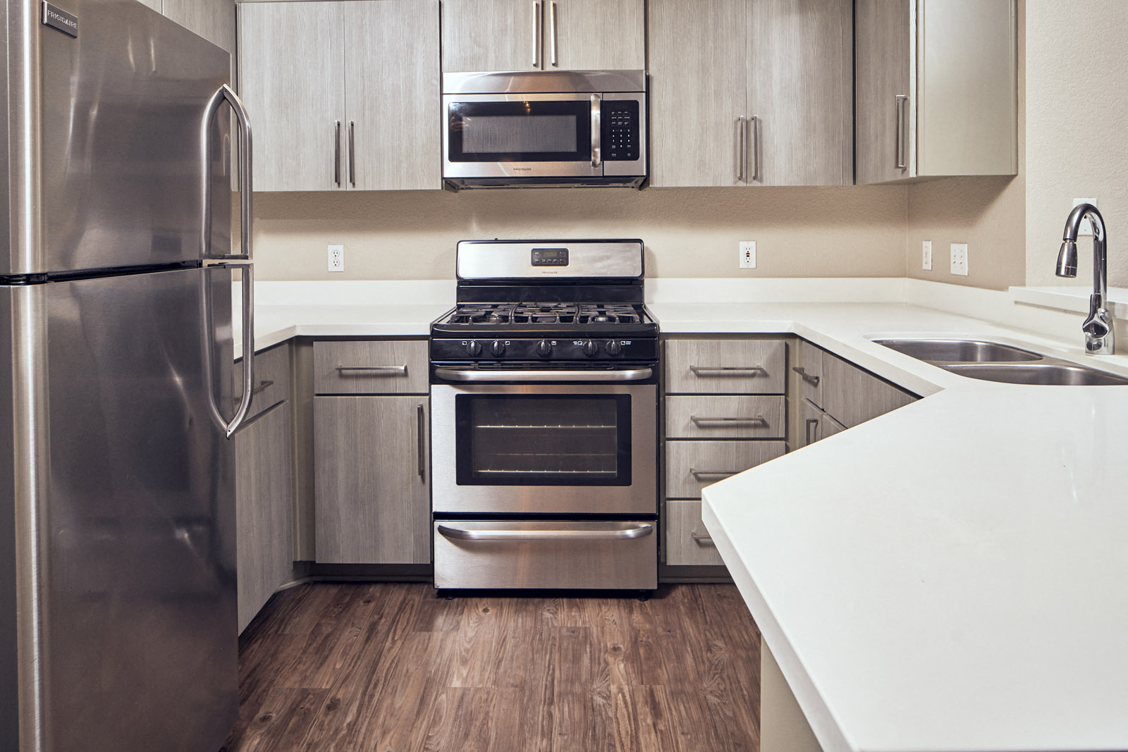 Apartments for Rent in Escondido, CA - Alta Vista Kitchen with stainless steel appliances, and modern wood cabinets