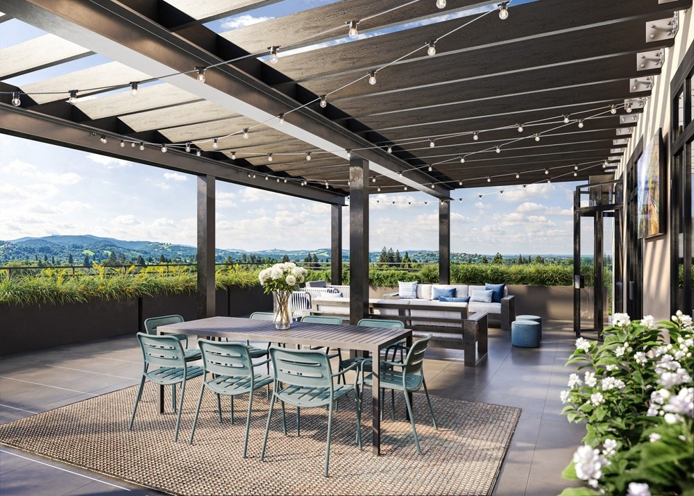 a dining area with a table and chairs under a pergola