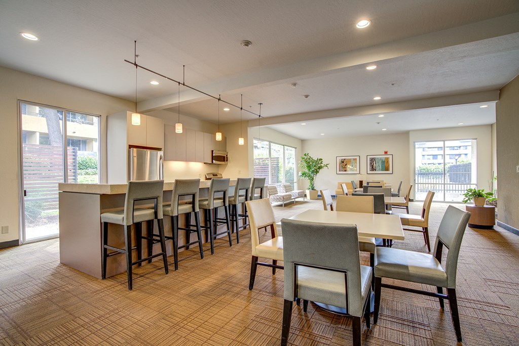Community kitchen and seating area at Americana Apartments, Mountain View, California