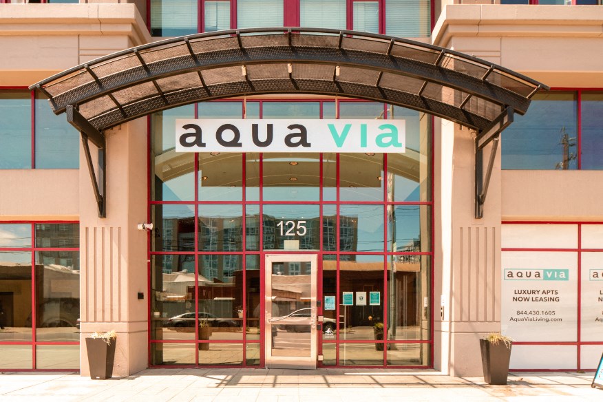 Aqua via entry way with property sign