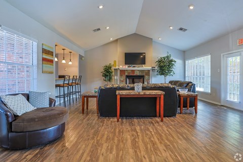 A living room with a fireplace and a couch.