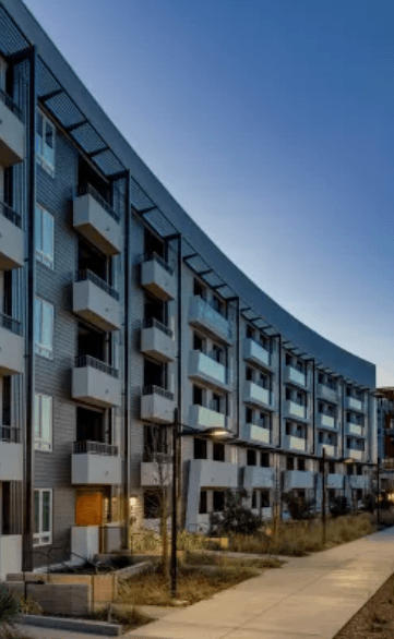 a large building with a street in front of it