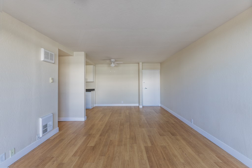 breswster unfurnished living room with wood flooring at Avenue Two Apartments, Redwood City  ,California, 94063