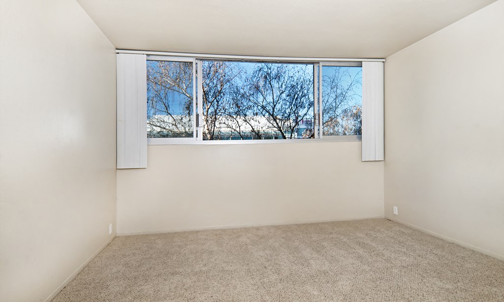 unfurnished bedroom with carpet flooring at Avenue Two Apartments, Redwood City  , California