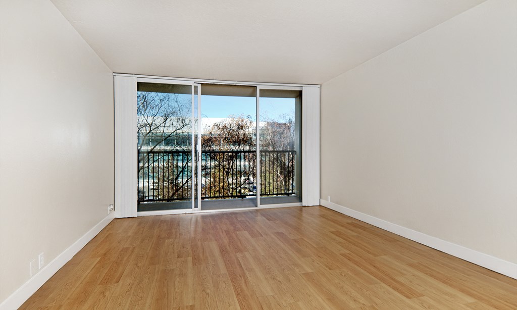 brewster unfurnished living room at Avenue Two Apartments, Redwood City  , CA