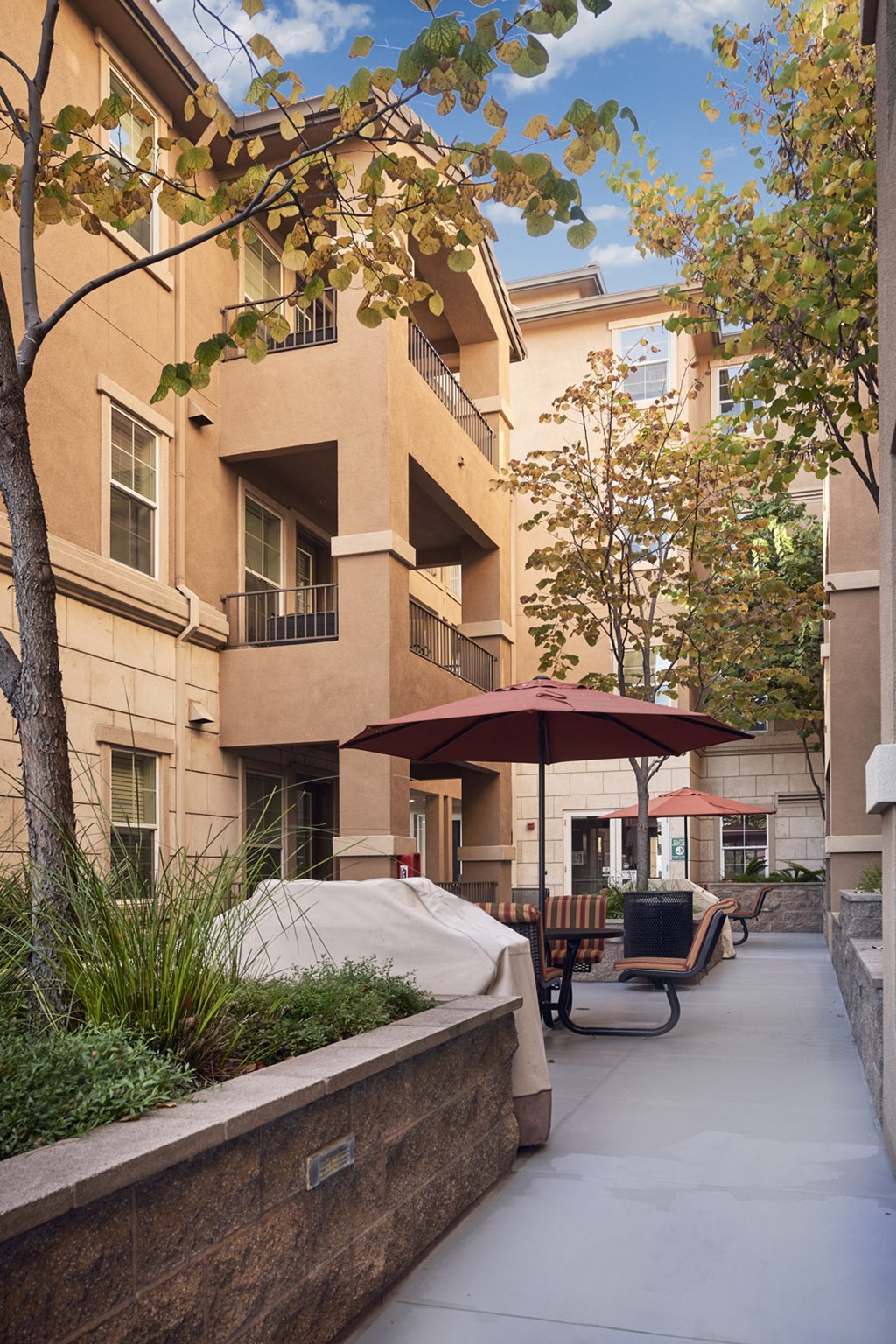 San Jose CA Apartments for Rent - Exterior View of the Apartment Building Showcasing Community Courtyard Area