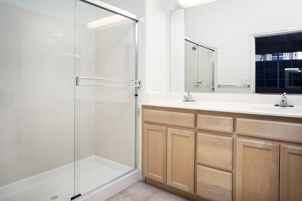 San Jose, CA Apartments for Rent - Aviara Apartments Bathroom with Wooden Cabinetry, Shower, and Bathtub