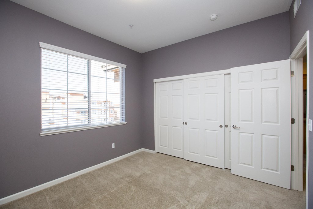 unfurnished bedroom with carpet