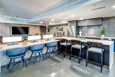 the pavilion resident lounge area with bar stools and chairs