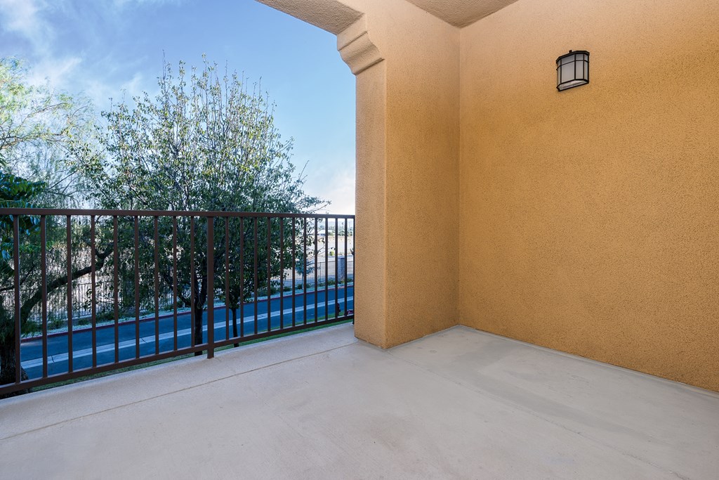 a balcony with of trees