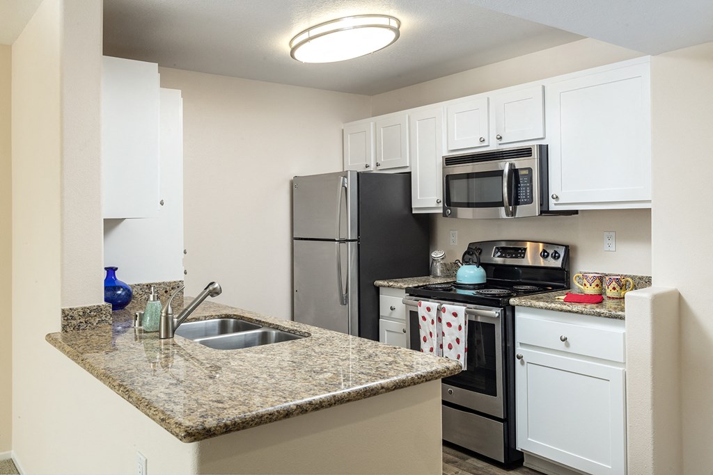Kitchen Bar With Granite Counter Top at 55+ FountainGlen Rancho Santa Margarita, Rancho Santa Margarita