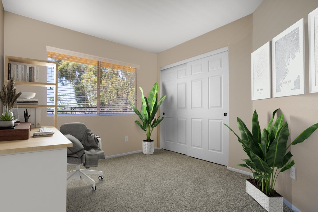 an office with a white door and a chair and plants at 55+ FountainGlen Rancho Santa Margarita, Rancho Santa Margarita, California