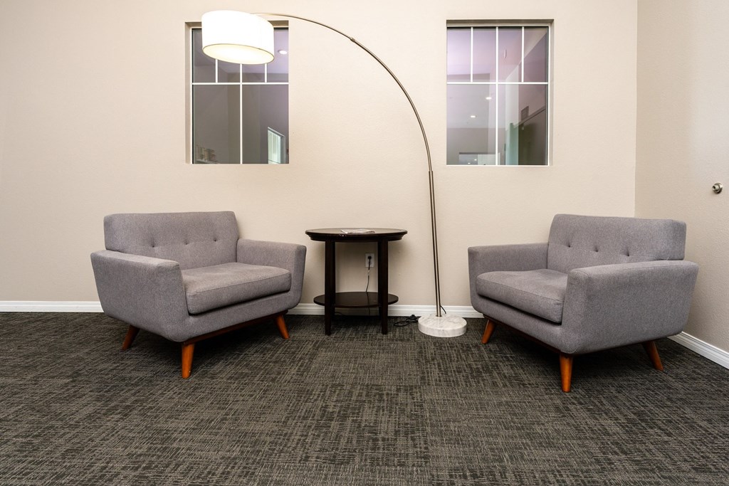 chairs and lamp in library