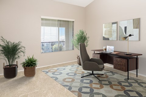 home office with desk chair and rug at 55+ FountainGlen Valencia, California