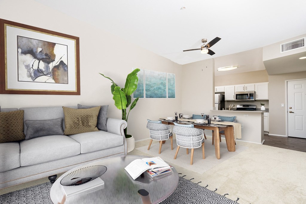 a living room with a couch and a dining room table at 55+ FountainGlen Valencia, Valencia
