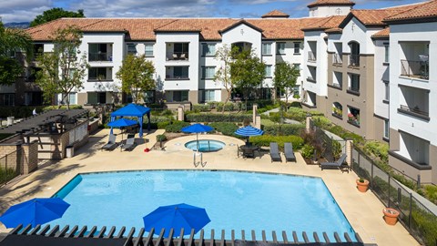 Aerial view of apartment and pool at 55+ FountainGlen Grand Isle, California