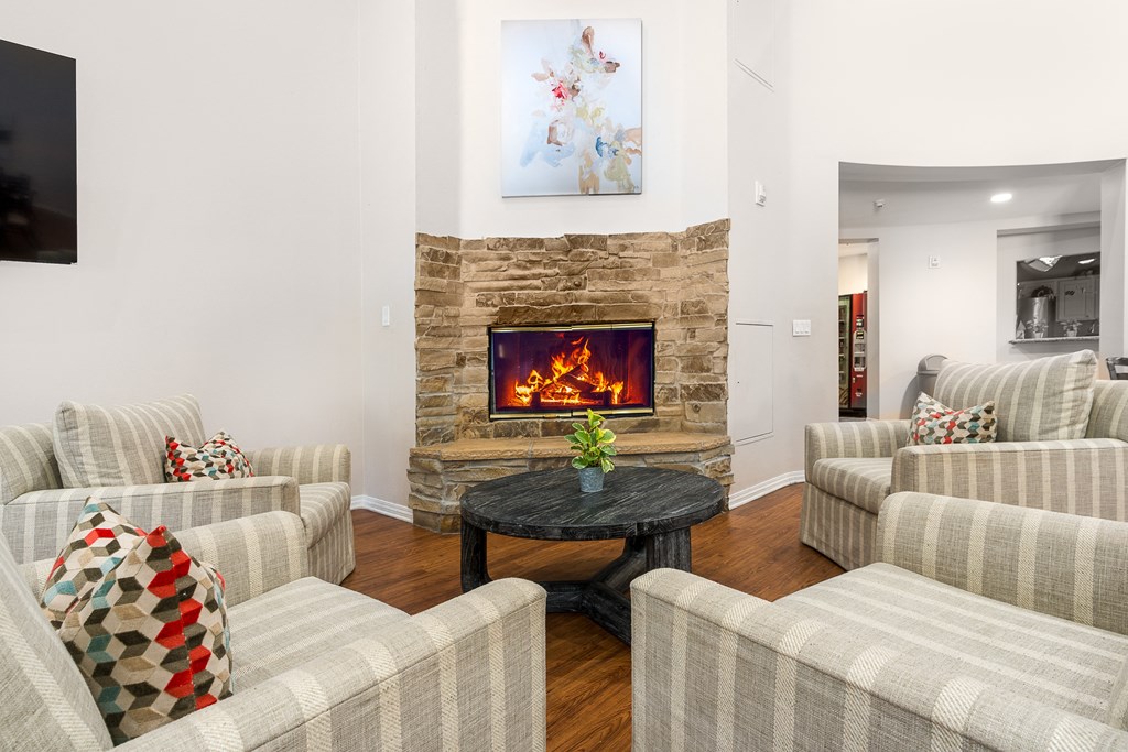a seating are in front of a fireplace at 55+ FountainGlen Temecula, Temecula, CA