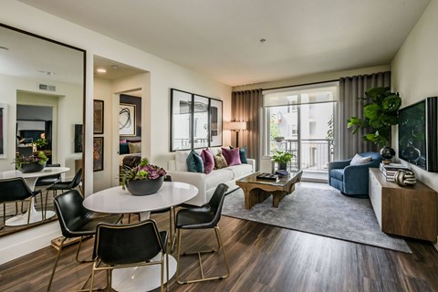 a living room with a couch and a table