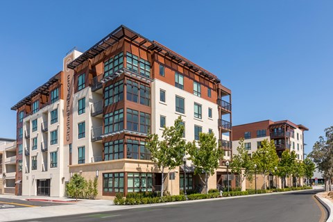 a large building with a street in front of it