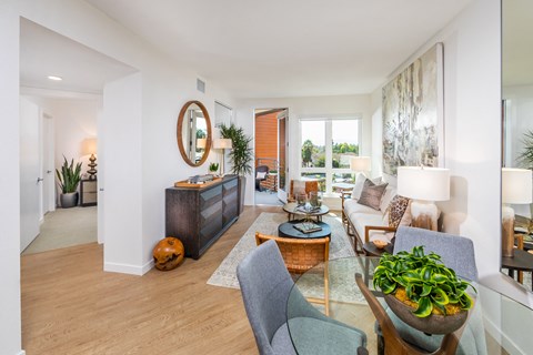 a living room with a couch and a table