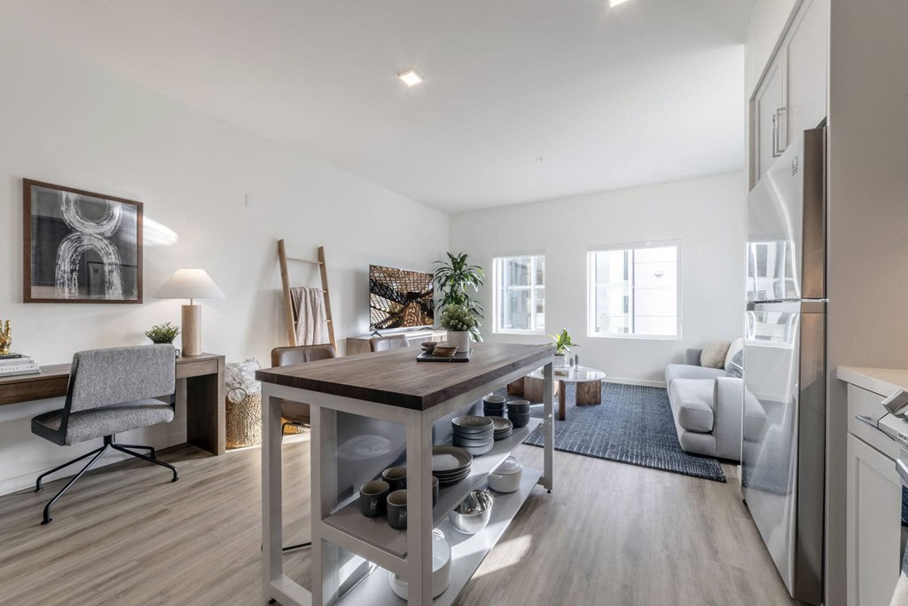 an open living room with a dining room table