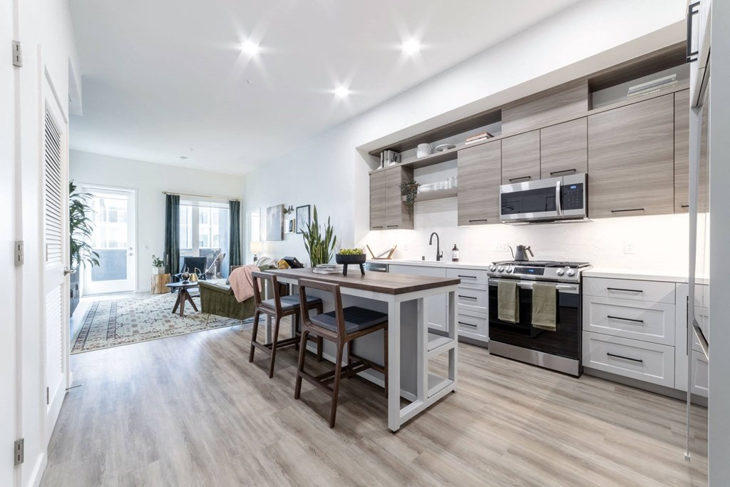 Kitchen with stainless steel appliances and island