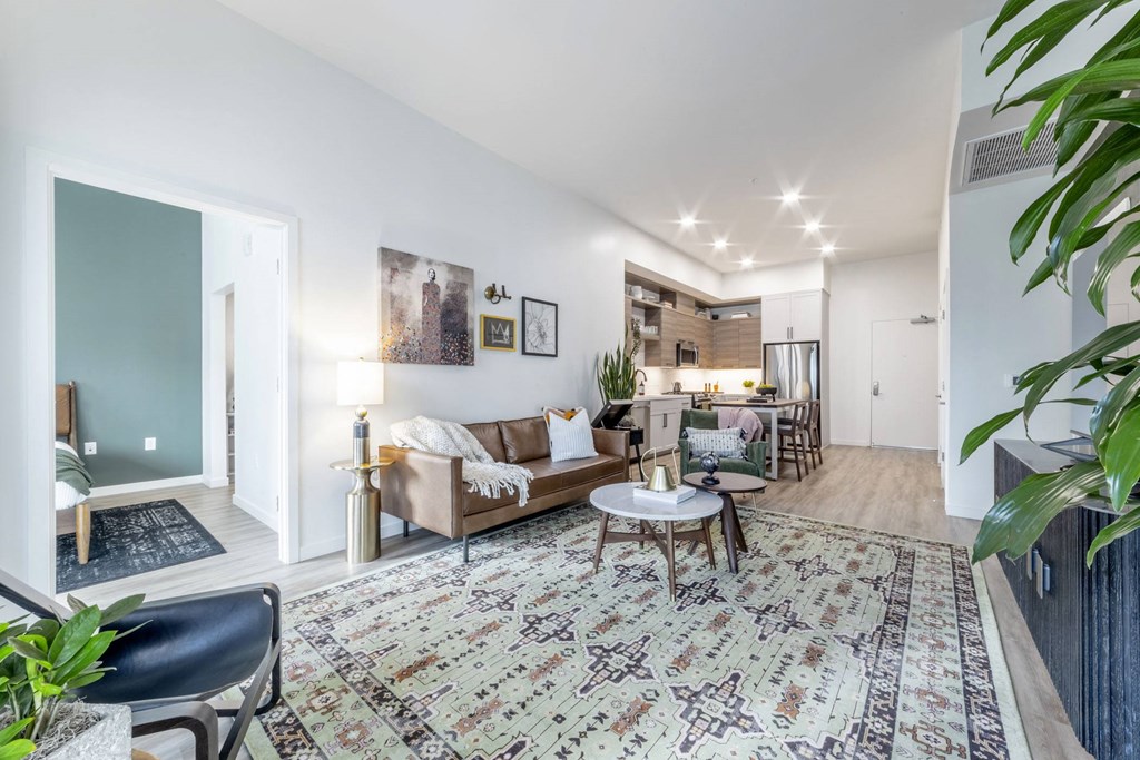 a living room with a couch and a table