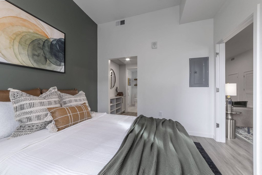 Bedroom with door to bathroom