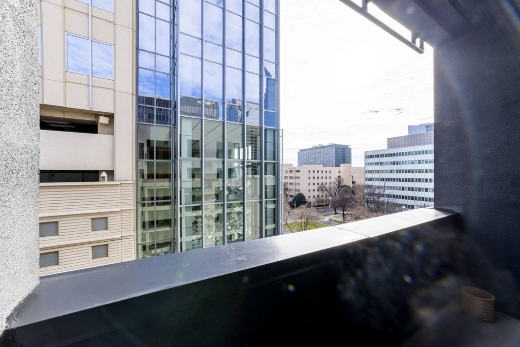 a view of the city from a balcony