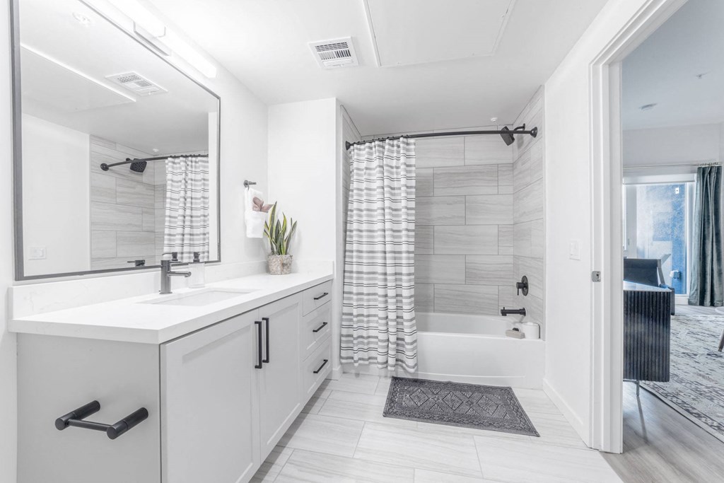 Bathroom with sink and tub