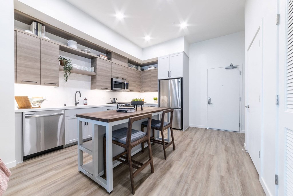 Kitchen with stainless steel appliances and island