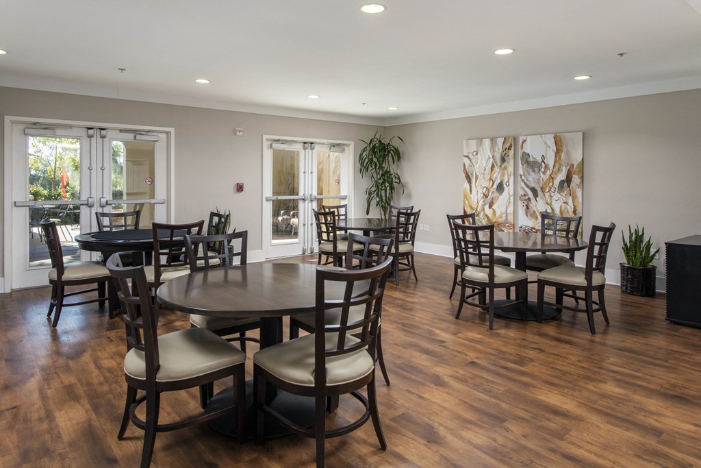 a dining room with tables and chairs at 55+ Remington at Ladera Ranch, Ladera Ranch, CA, 92694