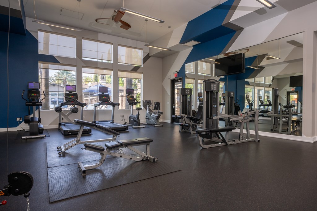 Gym with a variety of equipments at The Grove Apartments, California