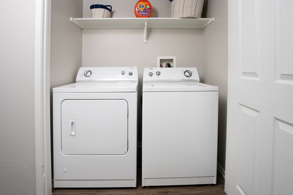 White washing machine and dryer at The Grove Apartments, California