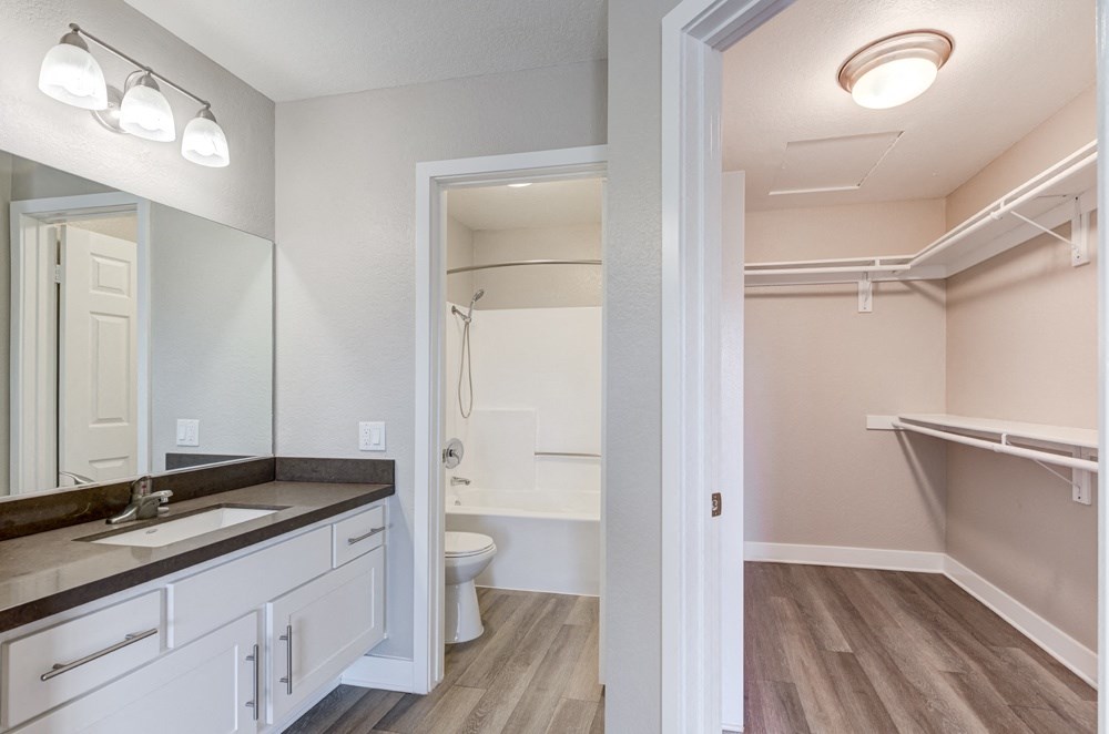 a bathroom with a mirror and a sink and a toilet at Harbor Pointe, Dana Point, CA