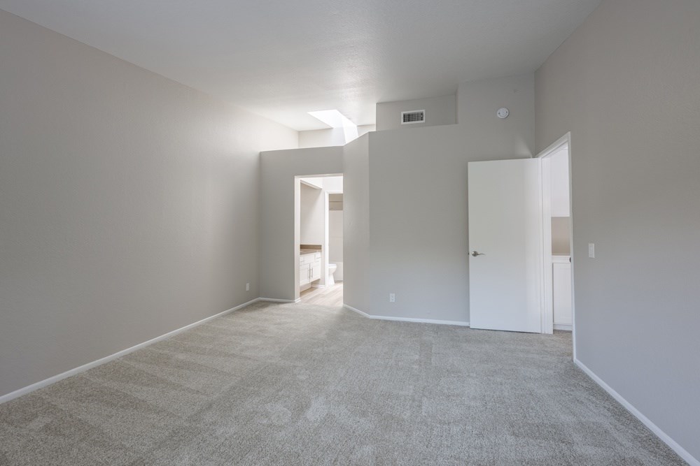 A room with carpeted floor and white walls. at Harbor Pointe, California