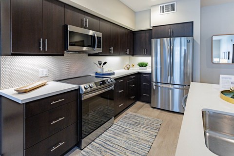 furnished kitchen with stainless steel appliances at Bayswater Apartments, Burlingame, CA