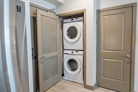 Stackable In-Unit Full-Size Front-Loading Washer And Dryer In Closet at Bayswater Apartments, Burlingame, 94010