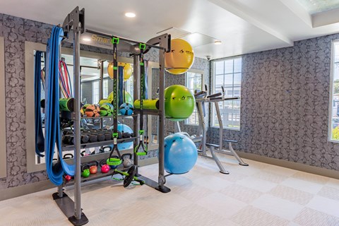 fitness center with exercise balls and yoga mats at Bayswater Apartments, Burlingame, CA