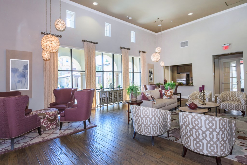 lobby with couches and chairs and a fireplace