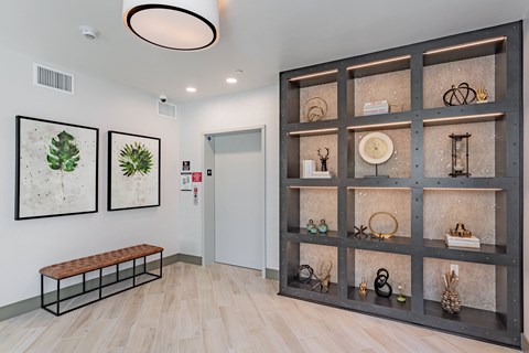 leasing lobby with decorative shelf at Bayswater Apartments, California