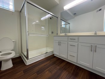 unfurnished bathroom with updated white cabinetry - Photo Gallery 4