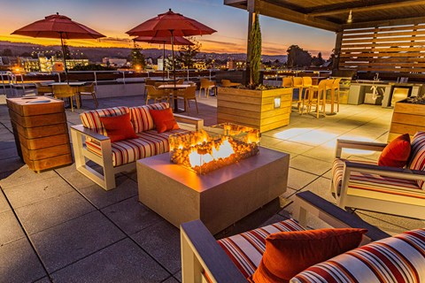 Rooftop lounge seating with fire pit at Bayswater Apartments, Burlingame, CA