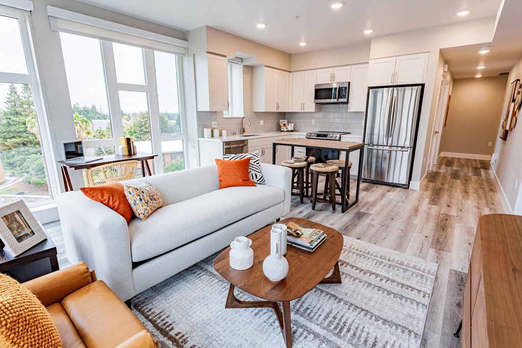 Livingroom with white couch and coffee table